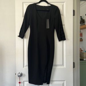 Black halo, black dress with cutouts size 2. Never worn